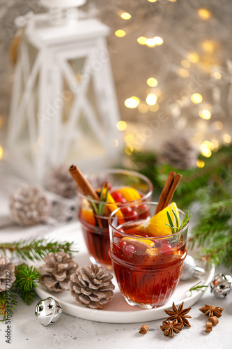 Christmas mulled wine. Traditional Xmas festive drink with decorations and fir tree