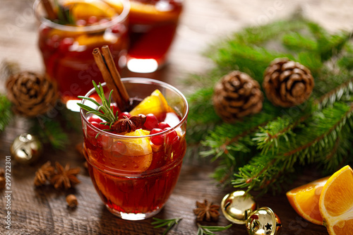 Christmas mulled wine. Traditional festive drink with decorations and fir tree.