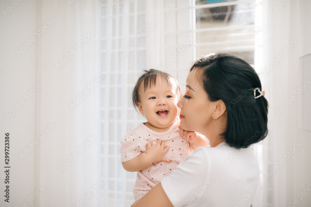 Single mom and daughter portrait. Happy family and people concept. Mother and Children day theme. Single mom and daughter portrait. Happy family and people concept. Mother and Children day theme.