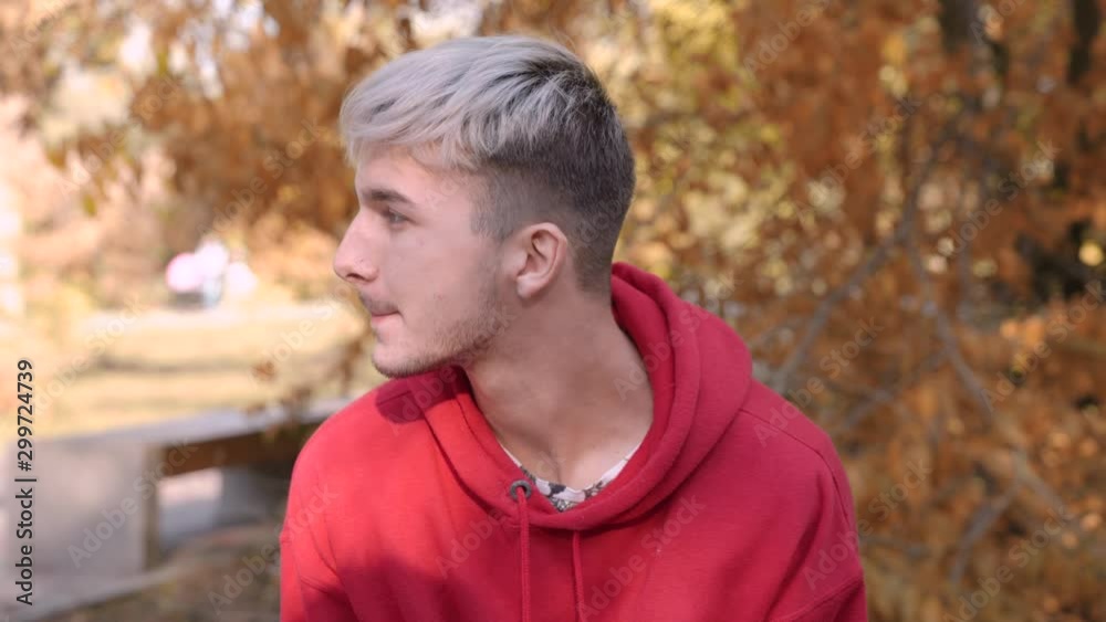 Young Stylish Man With Dyed Hair Outdoors Young Stylish Man With Dyed Hair Outdoors