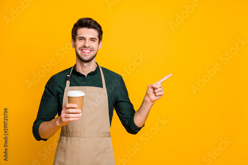 Fotografie Portrait of positive cheerful guy freelancer own coffee bar shop hold paper card