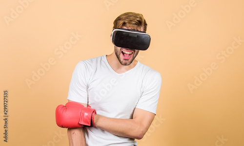 Sport is our life. modern gadget. Training boxing game. vr boxing. future innovation. man in VR glasses. Futuristic gaming. boxing in virtual reality. Digital sport success. man use new technology photo