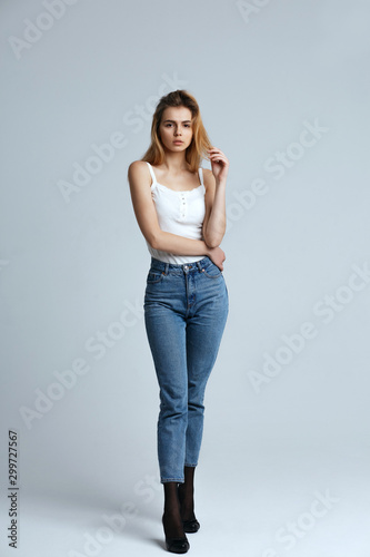 Full length shot of attractive girl wears stylish casual apparel