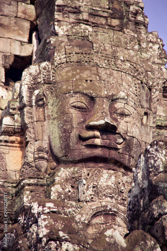 details of large carved face in Angkor Thom temple details of large carved face in Angkor Thom temple
