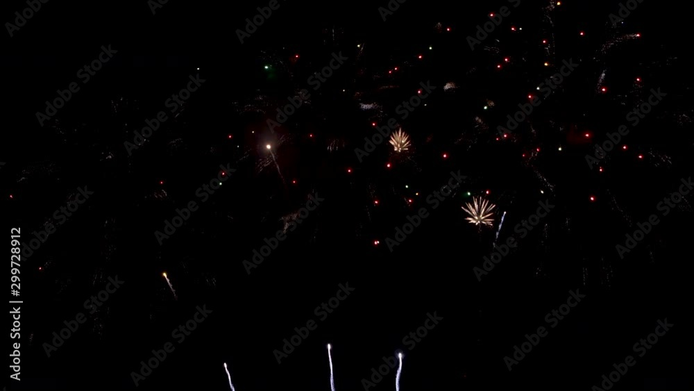Many flashing colourful fireworks in event amazing with black background celebrate New Year, holiday and festival in night. Many flashing colourful fireworks in event amazing with black background celebrate New Year, holiday and festival in night.
