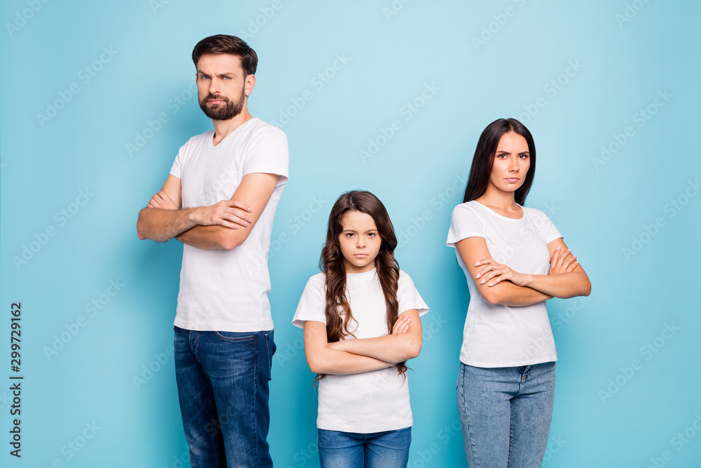 Portrait of disappointed beautiful mad family with brunet hair have  communication problem trouble wear white t-shirt denim jeans isolated over  blue color background Stock Photo | Adobe Stock