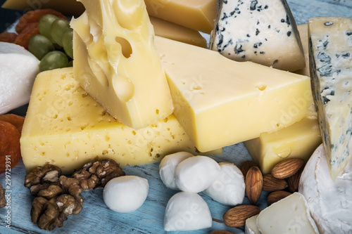 assorted cheeses, soft, hard, rennet and brine with fruits, nuts and dried fruits