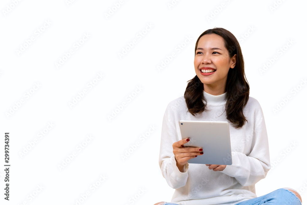 close up young beautiful asian woman holding digital tablet and looking away with toothy smile isolated on white background for advertisement banner and billboard design concept close up young beautiful asian woman holding digital tablet and looking away with toothy smile isolated on white background for advertisement banner and billboard design concept