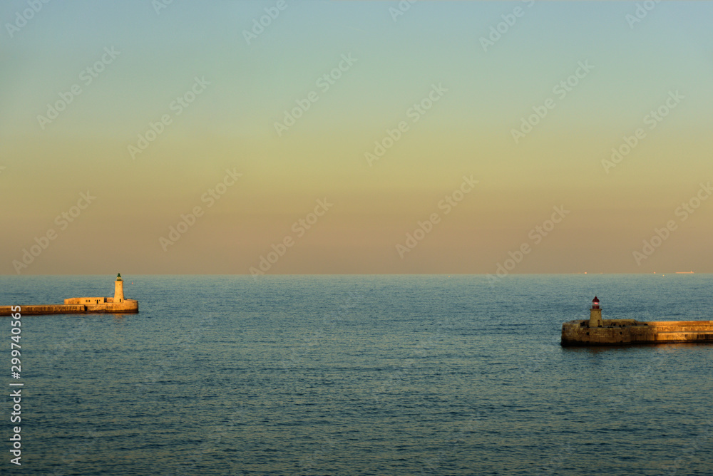 Two lighthouses at sunset Two lighthouses at sunset