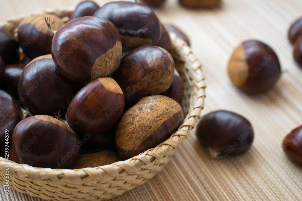 raw chestnuts in a basket