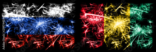 Russia, Russian vs Guinea, Guinean New Year celebration sparkling fireworks flags concept background. Combination of two states flags