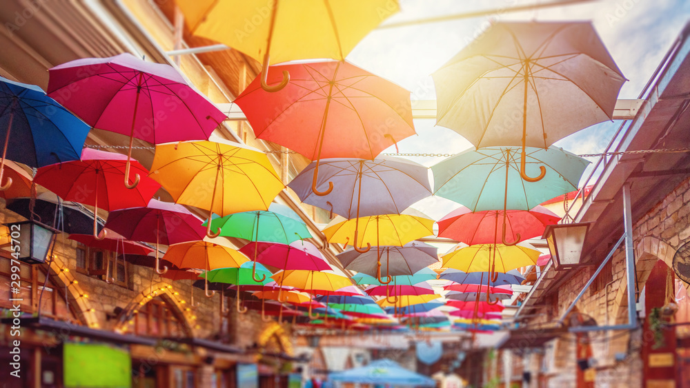 Limassol, Cyprus - 10.10.2019: Umbrellas in Limassol center street - obrazy, fototapety, plakaty 