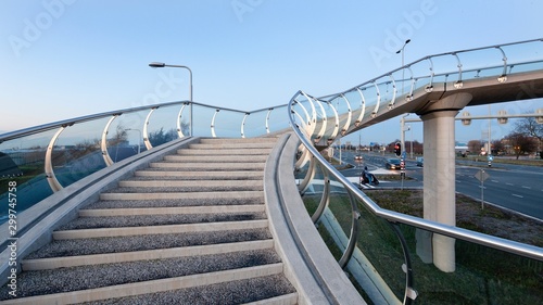 Glass pedestrian bridge Barendrecht Netherlands. Stairs. photo