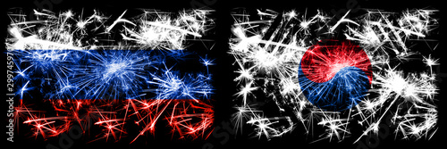 Russia, Russian vs South Korea, Korean New Year celebration sparkling fireworks flags concept background. Combination of two states flags © Vlad