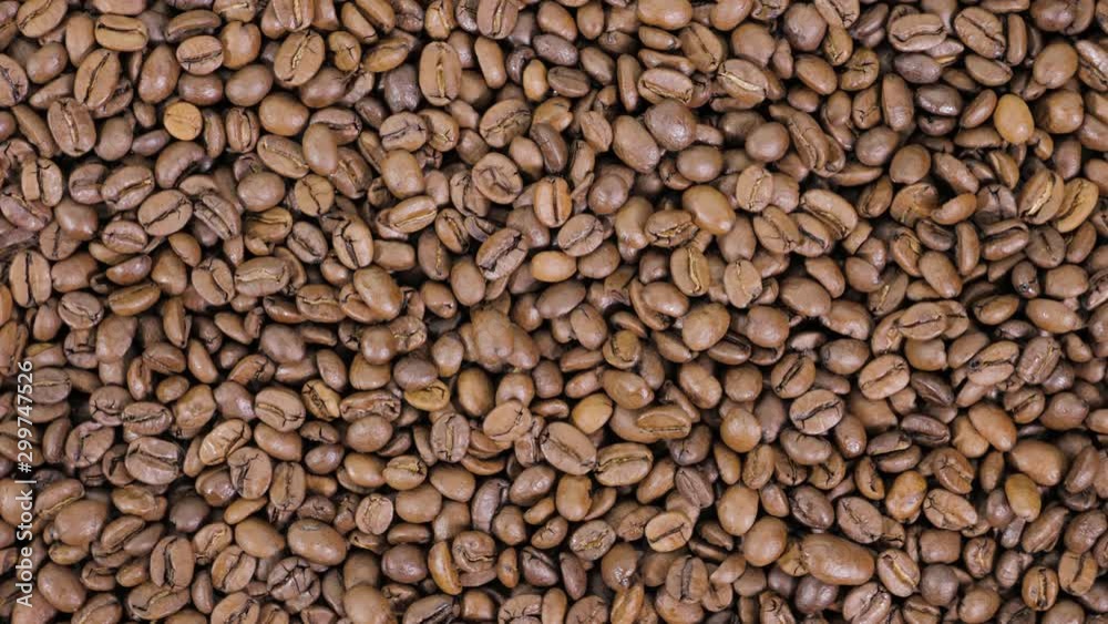 offee beans rotate while roasting. Smoke comes from coffee beans. offee beans rotate while roasting. Smoke comes from coffee beans.