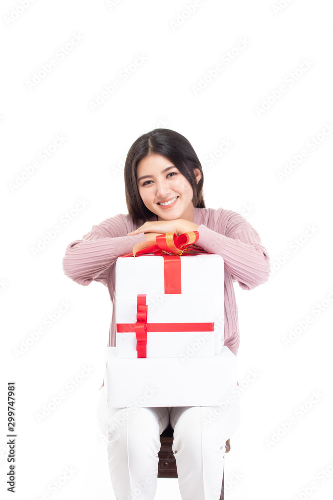 Attractive asian woman holding gift box in christmas, new year, valentine day, birthday celebration concept. Portrait of smiling happy pretty girl hold gift box isolated on white with copy space. Attractive asian woman holding gift box in christmas, new year, valentine day, birthday celebration concept. Portrait of smiling happy pretty girl hold gift box isolated on white with copy space.