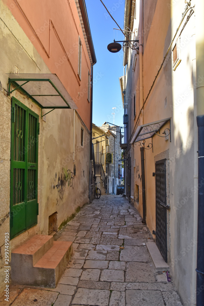 Fototapeta premium Venosa, Italy, 10/27/2019. A tourist visit in an ancient medieval town.