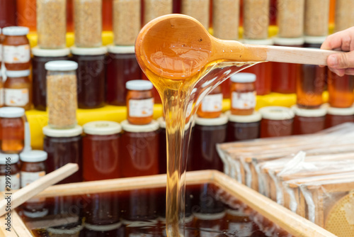 Fresh honey on a wooden spoon