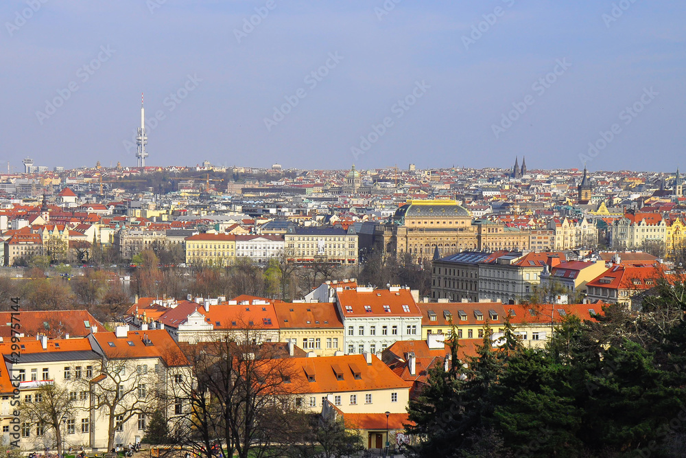 Panoramic view of Old Town  in Prague in a beautiful summer day. Top view to colorful roofs skyline of capital city Prague, Czech republic. 