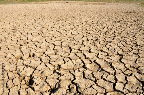 Dry cracked field. The global shortage of water on the planet. Global warming and greenhouse effect concept. Dry soil. 