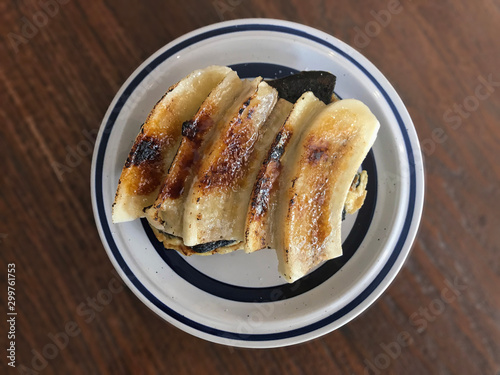 Fresh homemade toast with grilled banana topping - horizontal cutting. Delicious breakfast. 