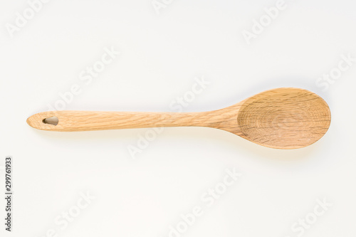 Traditional wooden spoon isolated on white background