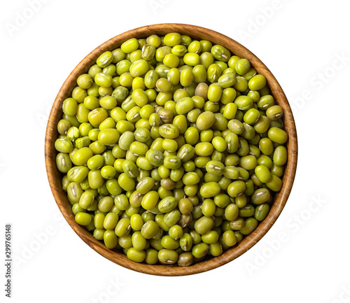Dry mung beans in wooden bowl isolated on white photo