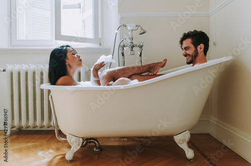 Fotografie Couple in love spending time together in the house