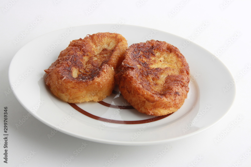 The torrijas are a typical Spanish dessert that is eaten for Easter, are made with milk and bread The torrijas are a typical Spanish dessert that is eaten for Easter, are made with milk and bread