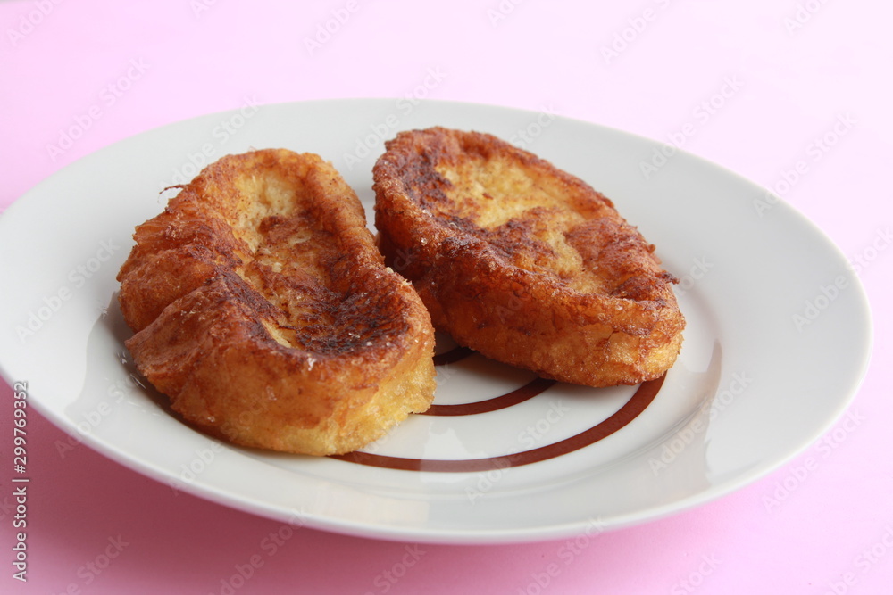The torrijas are a typical Spanish dessert that is eaten for Easter, are made with milk and bread The torrijas are a typical Spanish dessert that is eaten for Easter, are made with milk and bread