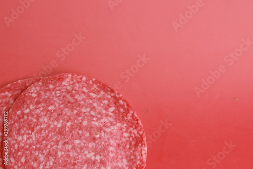 slices of salami in colorful background
