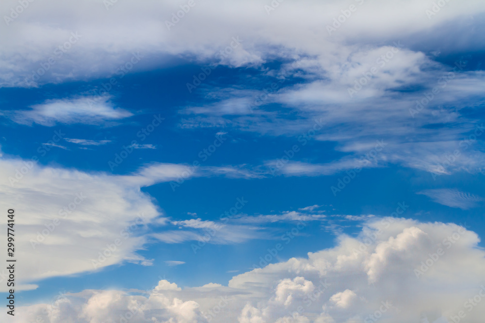 Blue sky and white fluffy clouds flying after hard raining. Background for business target or meteorology or inspiration Blue sky and white fluffy clouds flying after hard raining. Background for business target or meteorology or inspiration