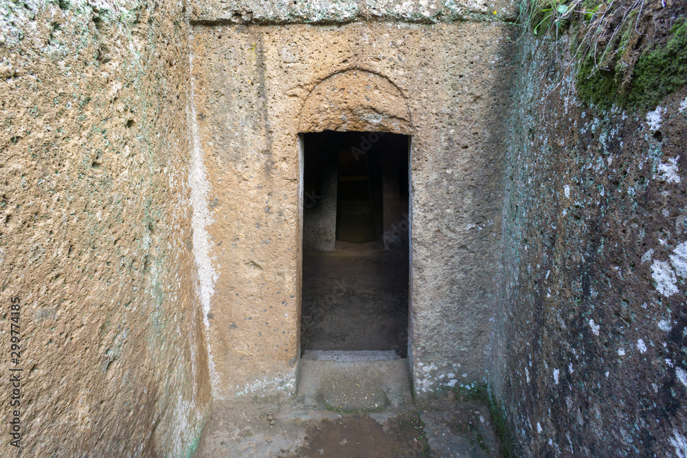 the entrance to an ancient Etruscan tomb, Etruscan necropolis (8th century b.C.) Cerveteri Rome Province, Italy. UNESCO World Heritage