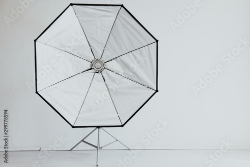 Flash on a white background in the Photo Studio equipment photo