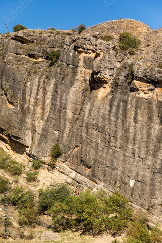 People climbing on the rock wall in the unused reservoir  which served to give drinking water to Madrid  called Ponton de la Oliva