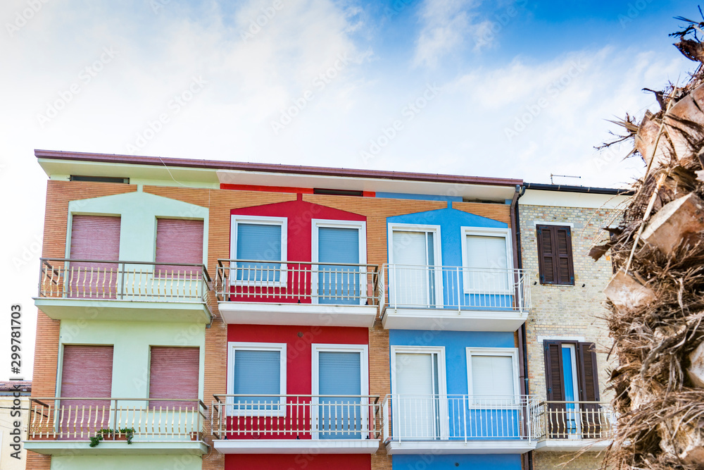 Colorful apartmens on the boulevard along the Adriatic Sea. Porto Recanati, Italy