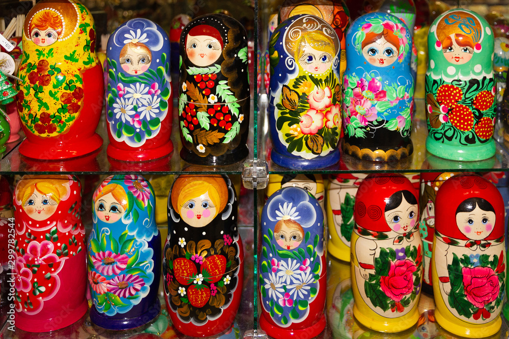 Dolls - wooden Russian matryoshk, Nesting souvenirs. - obrazy, fototapety, plakaty 