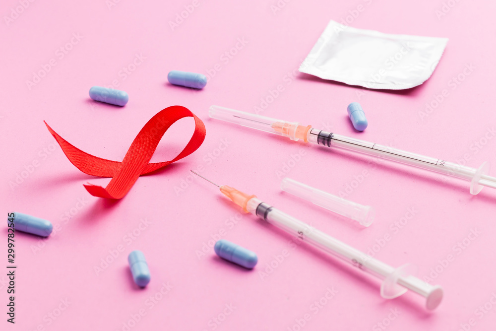 The red ribbon is an international symbol of HIV and AIDS awareness