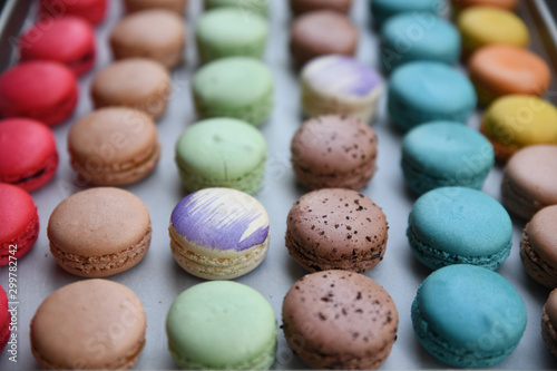 Close up of macarons on baking tray photo