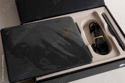 Graphic tablet with pen for illustrators and designers. Graphic digital touch tablet with pen