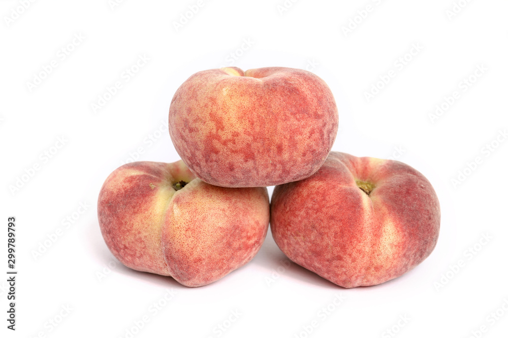 Selection of peaches shot on a white background Selection of peaches shot on a white background