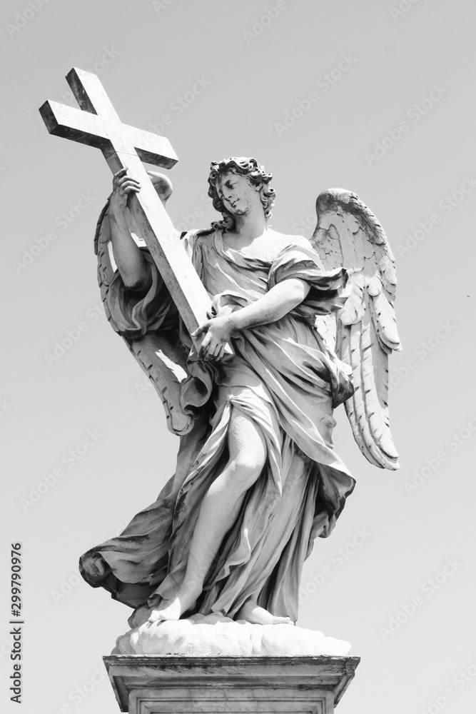 Obraz premium Bernini's sculpture along Sant'Angelo bridge before Castel S.Angelo in Rome, Italy. 