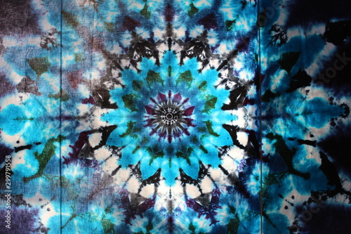 White and multicolored tie-dyed shirt