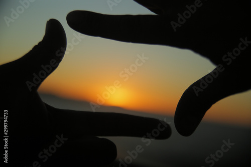 Hands Frame Silhouette on Sunset