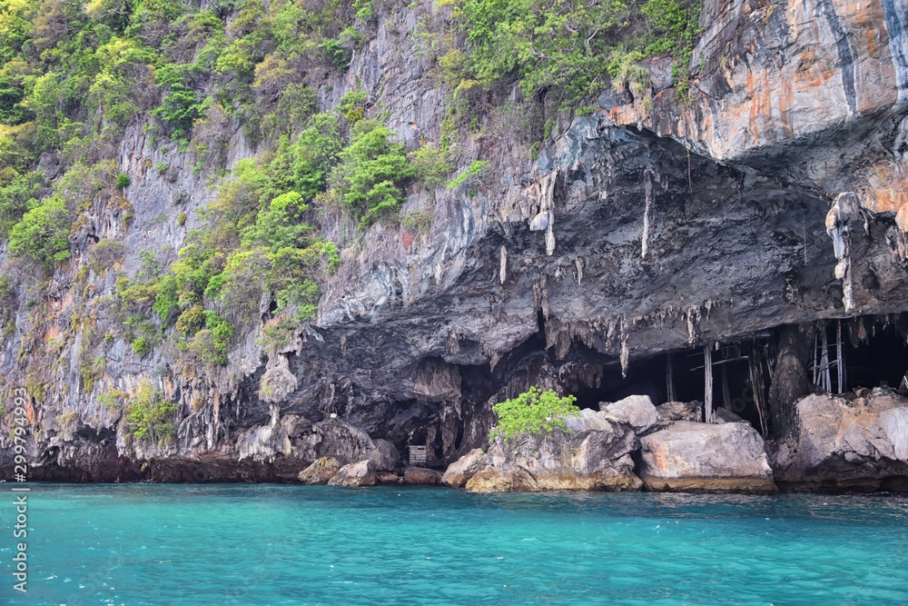 Island, Ocean views near Phuket Thailand with Blues, Turquoise and Greens oceans, mountains, boats, caves, trees resort island of phuket Thailand. Including Phi Phi, Ko Rang Yai, Ko Li Pe and other is Island, Ocean views near Phuket Thailand with Blues, Turquoise and Greens oceans, mountains, boats, caves, trees resort island of phuket Thailand. Including Phi Phi, Ko Rang Yai, Ko Li Pe and other is