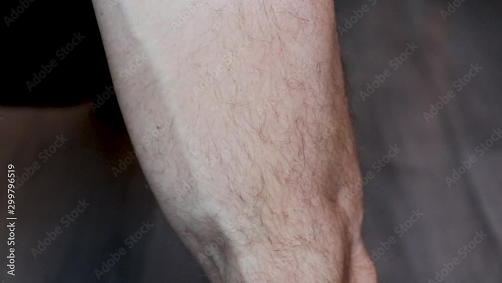 Strong Caucasian man push ups at home. Exercise for health and beauty.Close up Strong Caucasian man push ups at home. Exercise for health and beauty.Close up