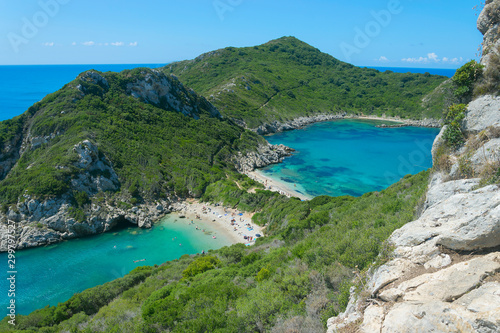 Azure crystal clear sea in Porto Timoni double beach in Corfu near village Agios Georgios Pagon. Beautiful twin Greek famous beach.