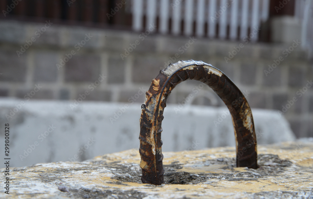 Fototapeta premium rusty iron ring on concrete floor