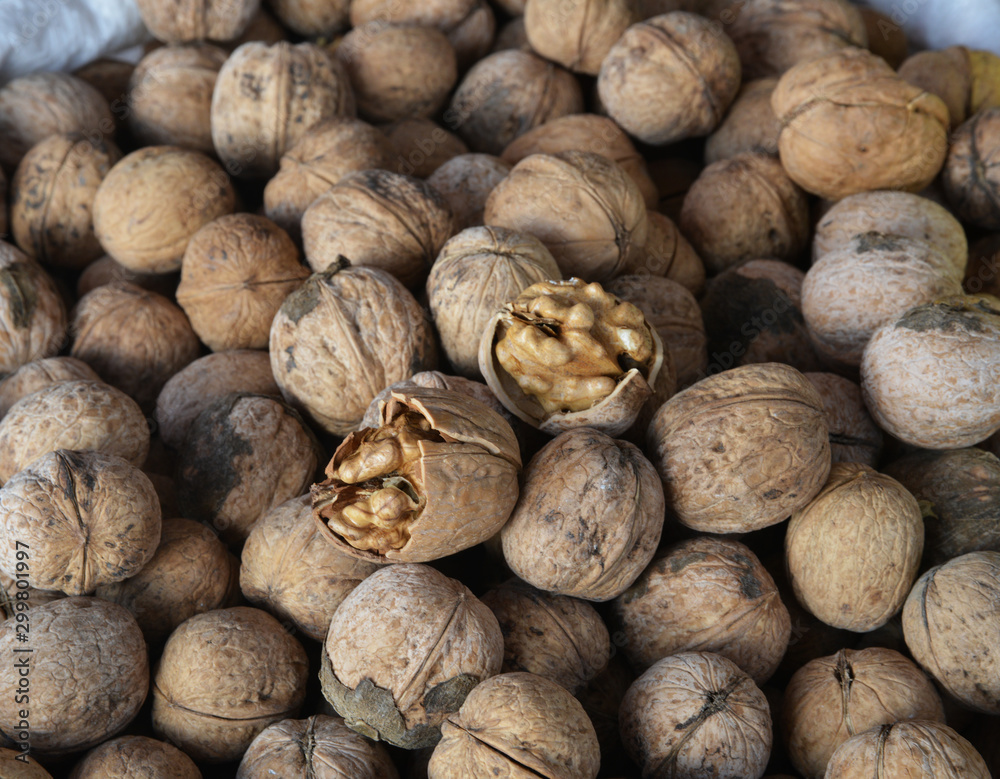 organic and fresh shelled walnuts on background organic and fresh shelled walnuts on background