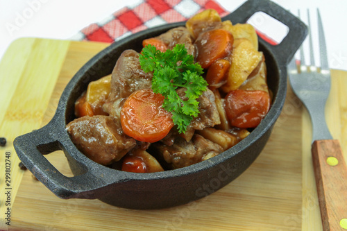 plate of beef bourguignon and potato